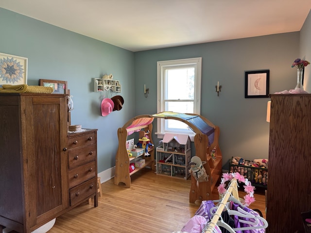 2111 W 3rd, Sault Ste Marie, MI 49783 - bedroom with light wood-style flooring and baseboards