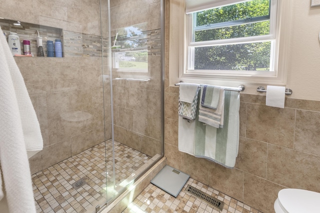 217 Cherry St, Houghton Lake, MI 48629 - full bathroom with a shower stall and tile walls