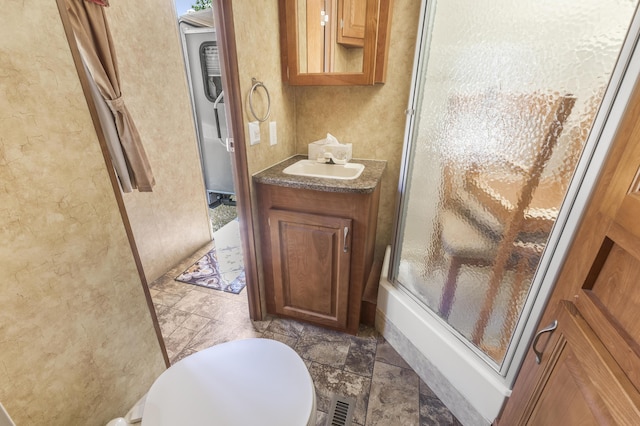 217 Cherry St, Houghton Lake, MI 48629 - bathroom with an enclosed shower and vanity