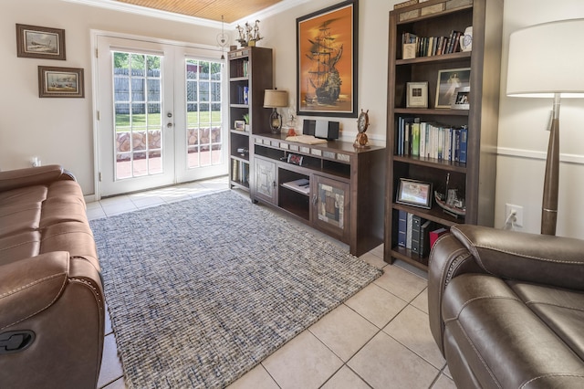 217 Cherry St, Houghton Lake, MI 48629 - tiled living room featuring ornamental molding and french doors