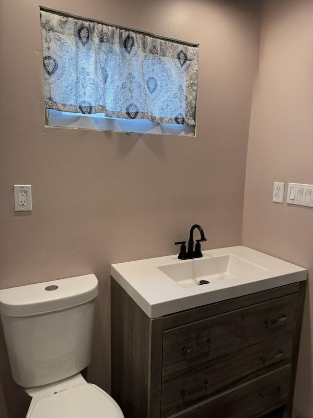 3134 Kneeland St, Lewiston, MI 49756 - half bath featuring vanity and toilet