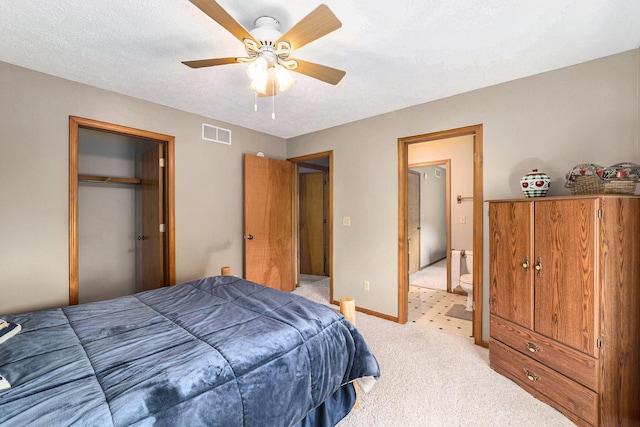 10702 Southwood Dr, Mancelona, MI 49659 - bedroom featuring light colored carpet, ceiling fan, a closet, and baseboards