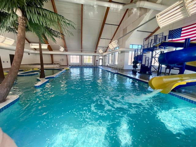 10702 Southwood Dr, Mancelona, MI 49659 - indoor community pool with a water slide