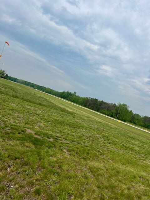 10702 Southwood Dr, Mancelona, MI 49659 - view of yard featuring a view of rural / pastoral area