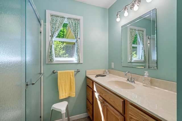 11193 Hassler Woods Trl, Alanson, MI 49706 - bathroom with vanity and a shower with shower door