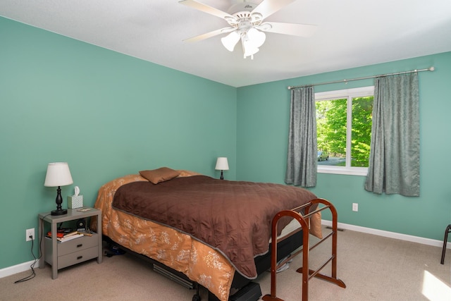 11193 Hassler Woods Trl, Alanson, MI 49706 - bedroom featuring carpet flooring, baseboards, and ceiling fan