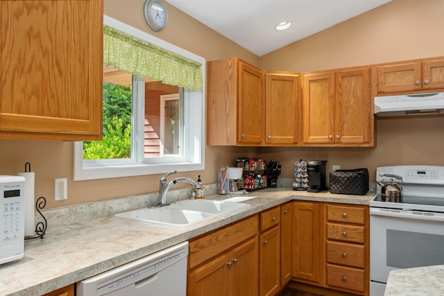 11193 Hassler Woods Trl, Alanson, MI 49706 - kitchen with white appliances, under cabinet range hood, a sink, light countertops, and lofted ceiling