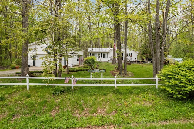 7106 Douglas Lake Rd, Johannesburg, MI 49751 - view of front of house featuring driveway