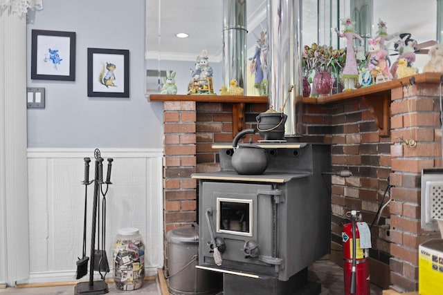 7106 Douglas Lake Rd, Johannesburg, MI 49751 - detailed view of a fire extinguisher, a wainscoted wall, and crown molding