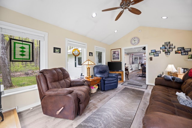 7106 Douglas Lake Rd, Johannesburg, MI 49751 - living area with a ceiling fan, healthy amount of natural light, vaulted ceiling, wood finished floors, and recessed lighting