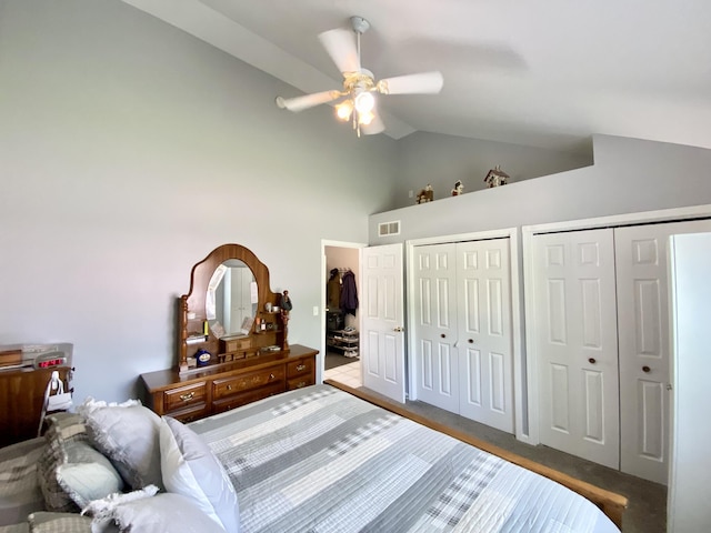 2476 W Branch Dr, West Branch, MI 48661 - bedroom featuring two closets, carpet flooring, a ceiling fan, and high vaulted ceiling