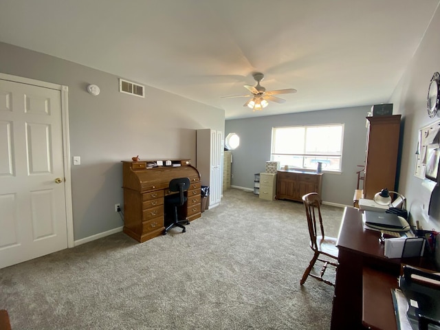 2476 W Branch Dr, West Branch, MI 48661 - home office with a ceiling fan, carpet, and baseboards