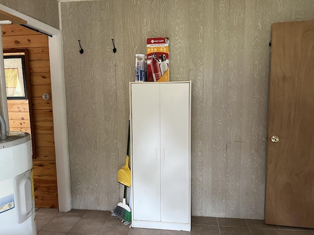 7781 N M-18, Roscommon, MI 48653 - unfurnished bedroom with electric water heater and tile patterned floors