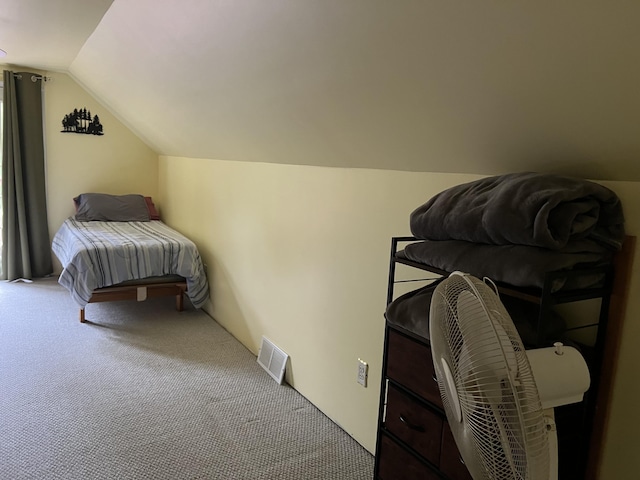 7781 N M-18, Roscommon, MI 48653 - carpeted bedroom featuring lofted ceiling