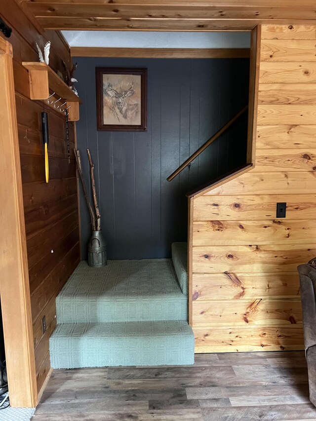 7781 N M-18, Roscommon, MI 48653 - stairs featuring wood finished floors and wooden walls