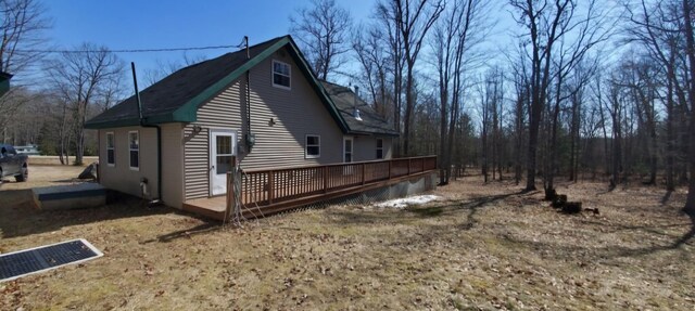 7781 N M-18, Roscommon, MI 48653 - view of property exterior with a deck