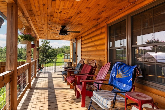 8406 S Shire Rd, Vanderbilt, MI 49795 - wooden deck with ceiling fan