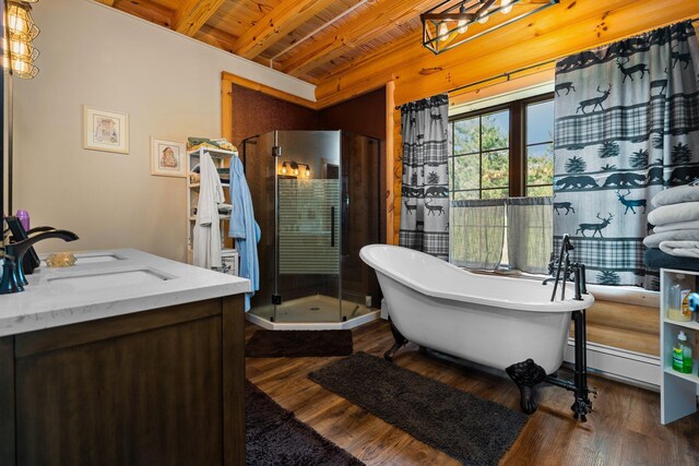 8406 S Shire Rd, Vanderbilt, MI 49795 - bathroom with baseboard heating, a stall shower, a wood ceiling with exposed beams, a freestanding tub, and wood finished floors