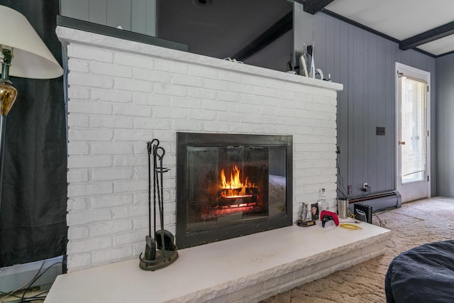 3869 Club Rd, Indian River, MI 49749 - detailed view of a brick fireplace, baseboard heating, carpet, wooden walls, and beam ceiling