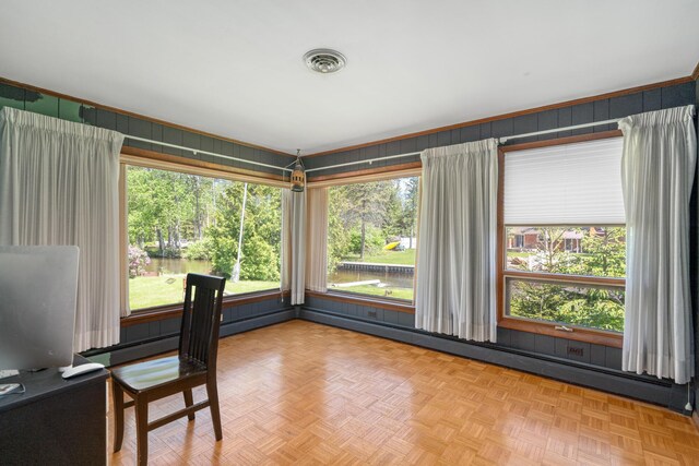3869 Club Rd, Indian River, MI 49749 - unfurnished office with healthy amount of natural light, wood walls, and view of wooded area