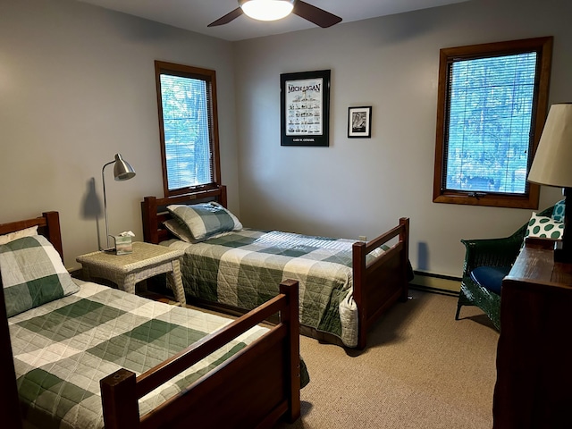 215 Pine Bluffs Rd, Roscommon, MI 48653 - bedroom with light carpet and a ceiling fan