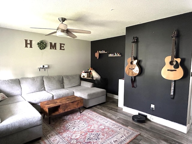 1200 Crestview Dr, Alpena, MI 49707 - living area with a ceiling fan, wood finished floors, baseboards, and a textured ceiling