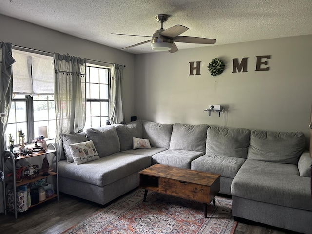 1200 Crestview Dr, Alpena, MI 49707 - living area with wood finished floors, a ceiling fan, and a textured ceiling