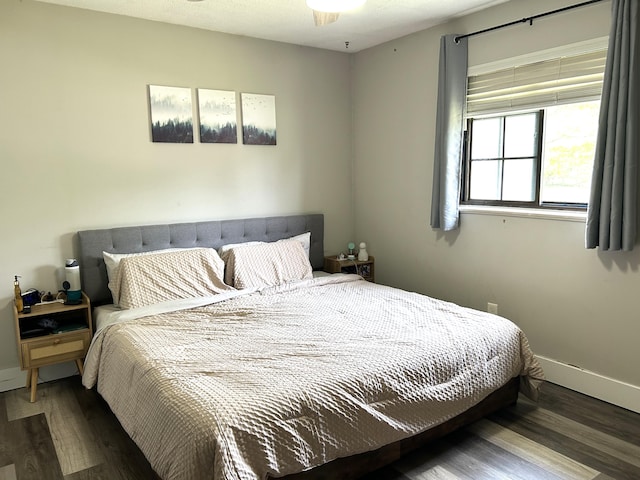 1200 Crestview Dr, Alpena, MI 49707 - bedroom featuring wood finished floors and baseboards