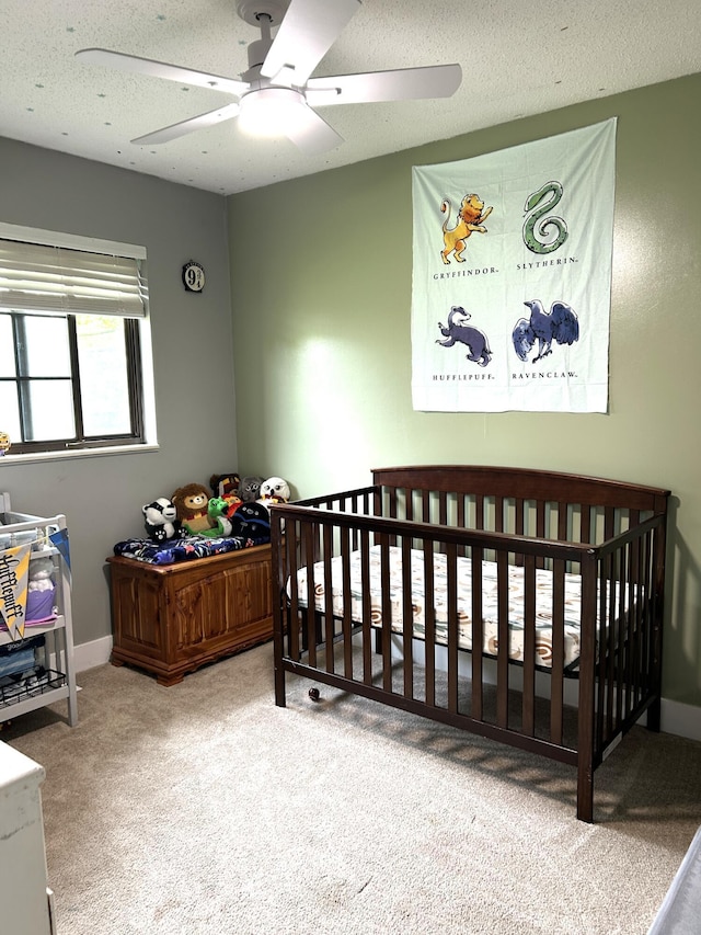 1200 Crestview Dr, Alpena, MI 49707 - bedroom featuring carpet floors, ceiling fan, a textured ceiling, and baseboards