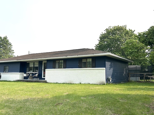 1200 Crestview Dr, Alpena, MI 49707 - ranch-style home with a porch