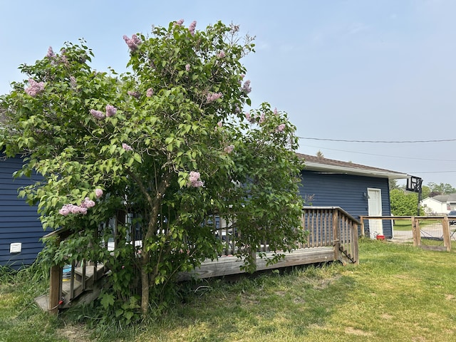 1200 Crestview Dr, Alpena, MI 49707 - view of yard with a wooden deck