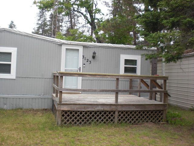 3123 Lovells Rd, Grayling, MI 49738 - doorway to property featuring a deck
