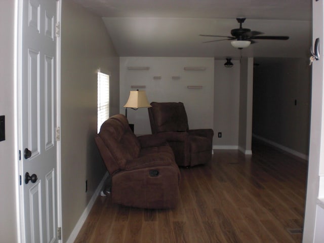 3123 Lovells Rd, Grayling, MI 49738 - living area featuring wood finished floors, a ceiling fan, baseboards, and vaulted ceiling