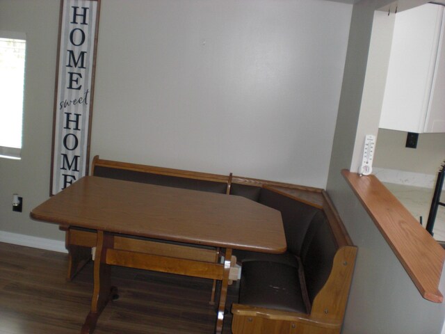 3123 Lovells Rd, Grayling, MI 49738 - dining room with wood finished floors, baseboards, and plenty of natural light