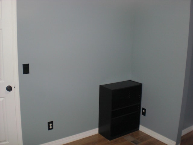 3123 Lovells Rd, Grayling, MI 49738 - detailed view of wood finished floors and baseboards