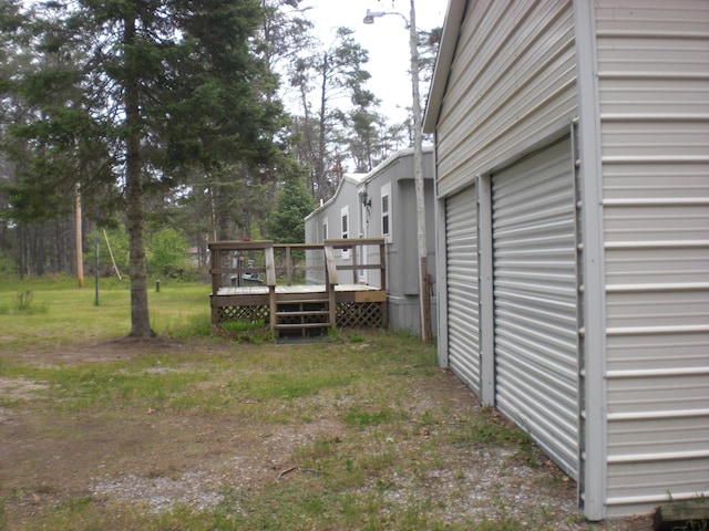 3123 Lovells Rd, Grayling, MI 49738 - view of yard with a wooden deck