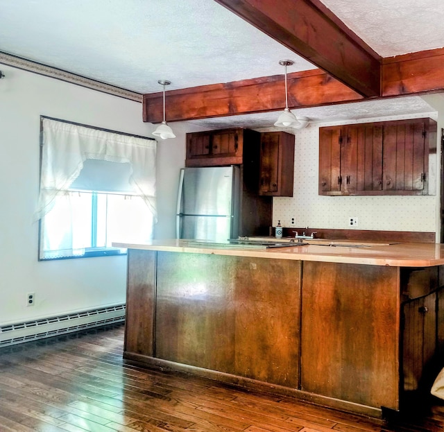206 Redwine Dr, Houghton Lake, MI 48629 - kitchen featuring freestanding refrigerator, a baseboard heating unit, dark wood-style flooring, beamed ceiling, and a textured ceiling