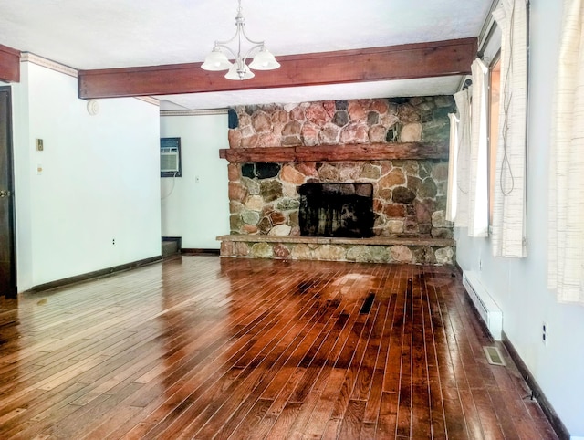 206 Redwine Dr, Houghton Lake, MI 48629 - unfurnished living room featuring a baseboard heating unit, hardwood / wood-style floors, beam ceiling, a chandelier, and a stone fireplace