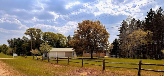 6309 Hiawatha Dr, Frederic, MI 49733 - view of yard featuring driveway