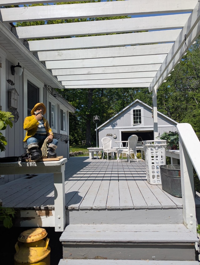 17740 Grand Lake Blvd, Presque Isle, MI 49777 - wooden terrace with an outbuilding and a pergola