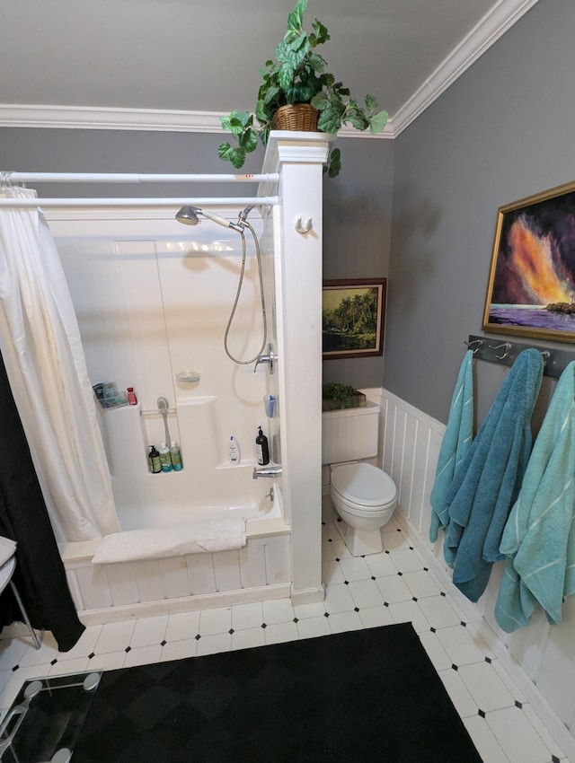 17740 Grand Lake Blvd, Presque Isle, MI 49777 - bathroom featuring toilet, tile patterned floors, shower / bathtub combination with curtain, wainscoting, and ornamental molding
