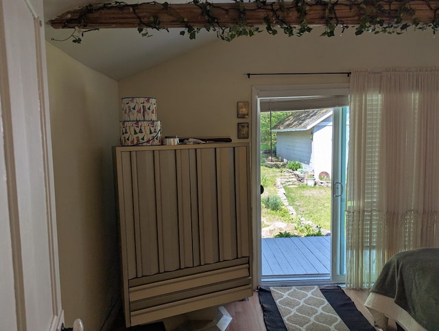 17740 Grand Lake Blvd, Presque Isle, MI 49777 - entryway with vaulted ceiling and wood finished floors