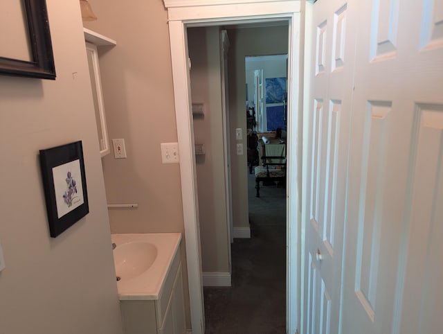 17740 Grand Lake Blvd, Presque Isle, MI 49777 - bathroom featuring vanity and baseboards