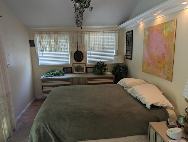 17740 Grand Lake Blvd, Presque Isle, MI 49777 - bedroom with lofted ceiling, wood finished floors, and baseboards