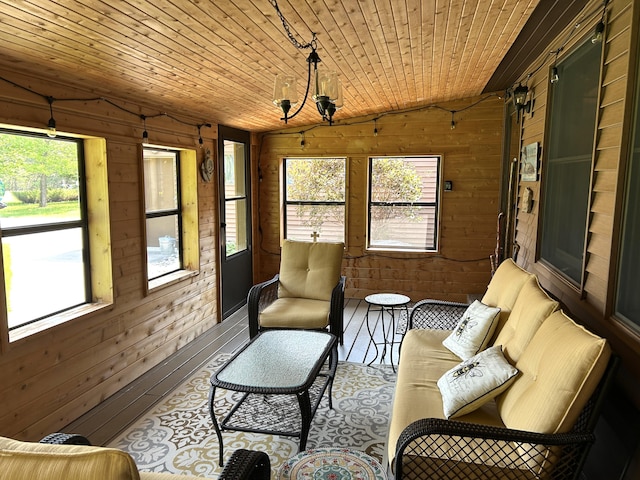 5392 Silver Beach Rd, Onaway, MI 49765 - sunroom with vaulted ceiling