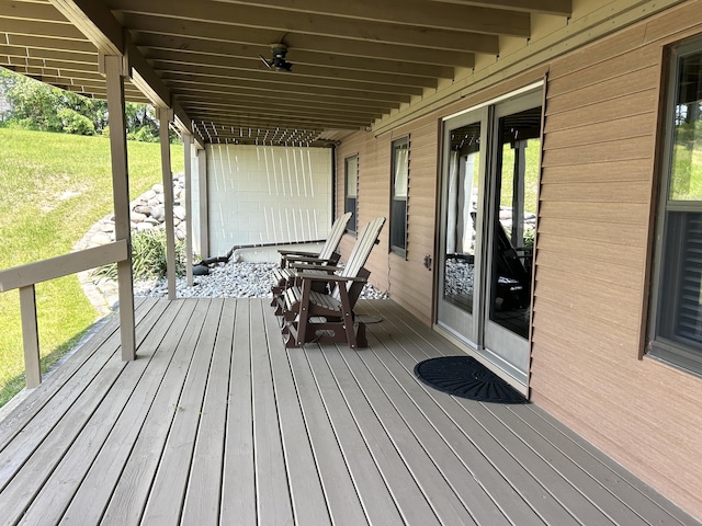 5392 Silver Beach Rd, Onaway, MI 49765 - wooden terrace featuring a lawn