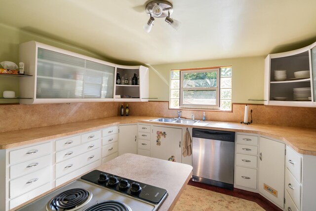 9150 W M-68, Indian River, MI 49749 - kitchen with dishwasher, open shelves, range, white cabinets, and light countertops