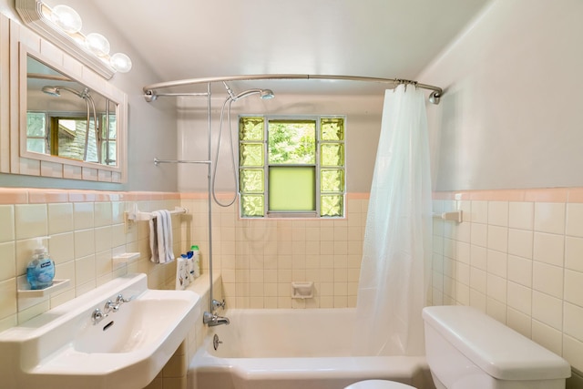 9150 W M-68, Indian River, MI 49749 - bathroom with tile walls, shower / bathtub combination with curtain, and wainscoting