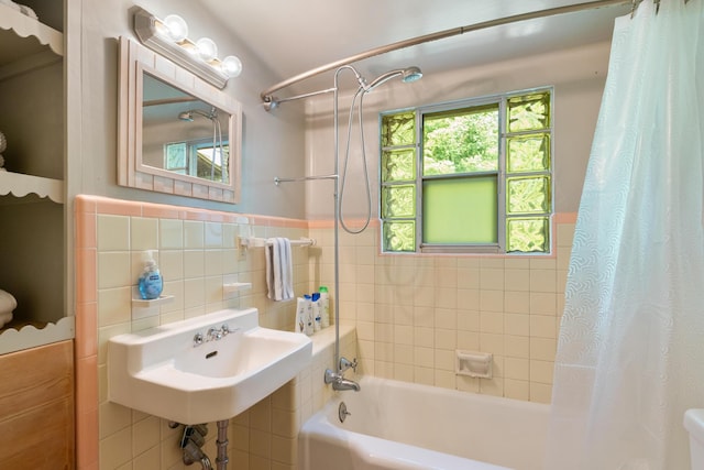 9150 W M-68, Indian River, MI 49749 - full bath with tile walls, shower / tub combo, and a wainscoted wall