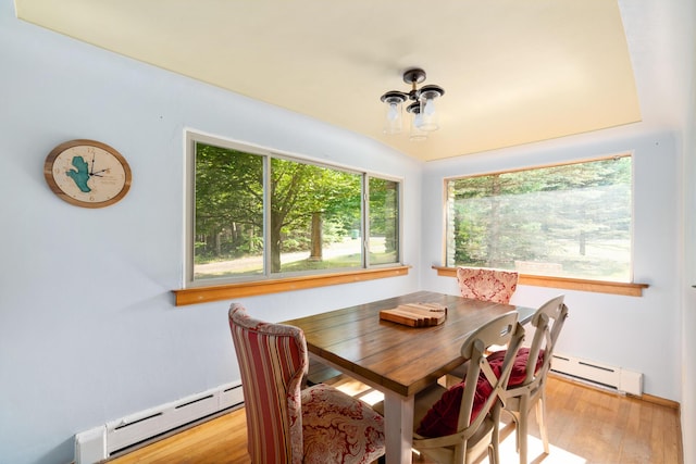 9150 W M-68, Indian River, MI 49749 - dining room with a baseboard radiator and light wood-style floors